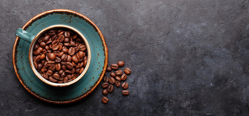 Coffee cup with roasted coffee beans