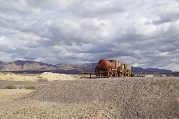 Scenic view of the wagon at Harmony Borax Works in Death Valley National Park, on a stormy and cloudy day      