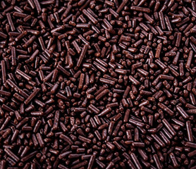 Background texture of chocolate sprinkles.
