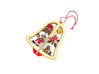Wooden hanging bell for christmas decorations isolated on white background.