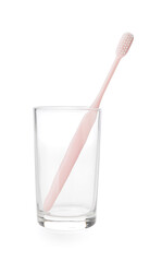 Holder with toothbrush on white background