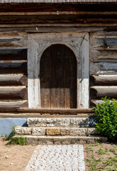 Fototapeta na wymiar wooden door in rustic old peasant house