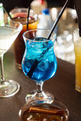 different kinds of cocktails in the bar