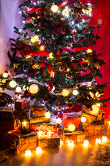 Fototapeta na wymiar Beautiful Christmas tree with lights