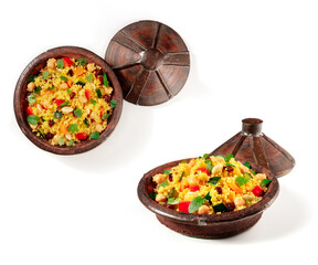 Couscous in a tagine on a white background, overhead and angle view, a set