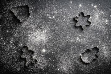 Background with ingredient for making gingerbread cookies before Christmas. Christmas traditions. Christmas decorations. Shot from above.