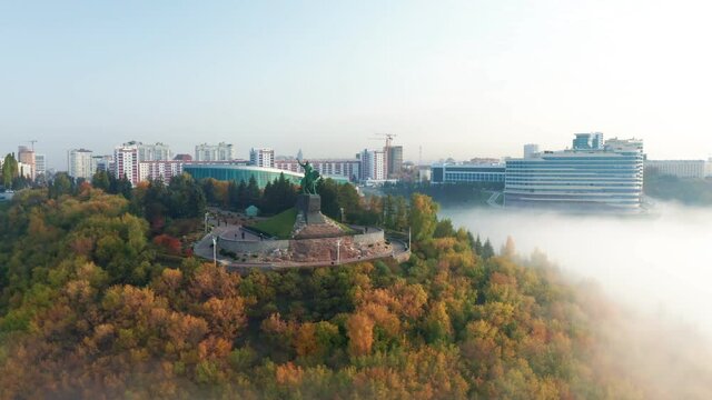 Aerial Shot of cultural and historical center of Ufa. The capital of Bashkortostan at beautiful sunset in the fog. Russia / City Center. High quality 4k footage