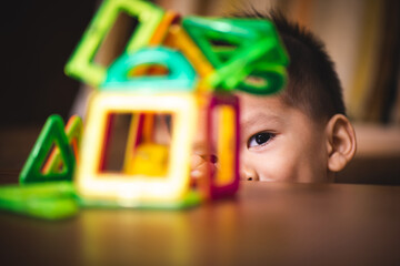 baby playing the magnetic tiles