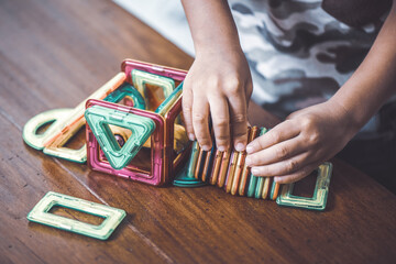 baby playing the magnetic tiles