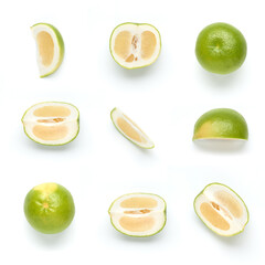 Citrus Sweetie or Pomelit, oroblanco with slices isolated on white background close-up. Top view. Flat lay