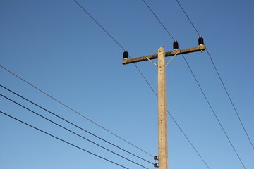 power lines on a blue sky