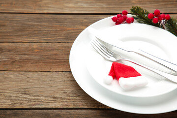 Christmas table place setting with decoration. Holidays background