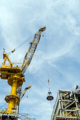 A typical offshore pedestal crane on an oil production platform
