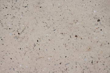 Light beige concrete wall surface with spots texture macro