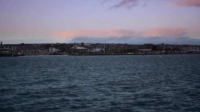 The sun setting over the harbour