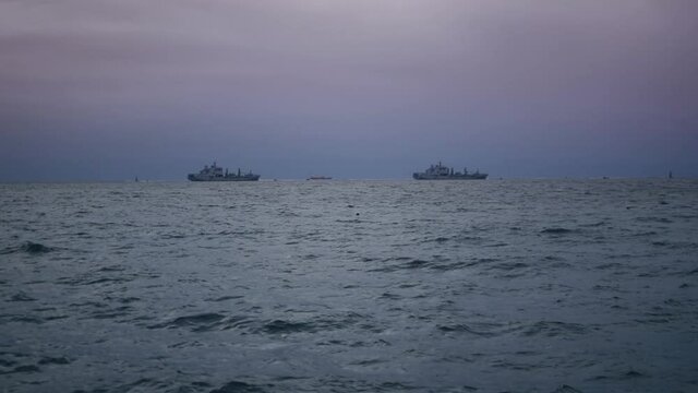 Two ships amongst the setting sun