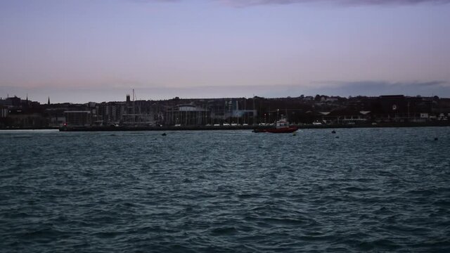 The last of the boats coming into the harbour for the night