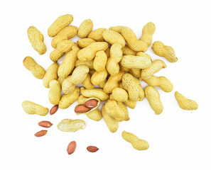 Heap of organic peanuts in shell isolated on white background. 