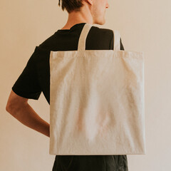 Back view man carrying tote bag