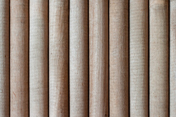 Vertical light sticks wooden background