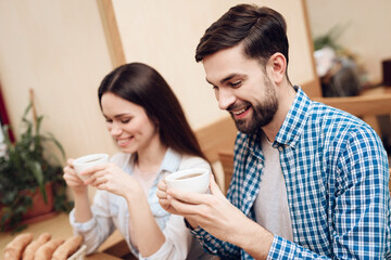 Happy Young Couple Have Date in Modern Cafeteria.
