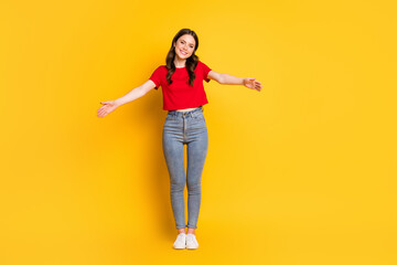 Full size photo of charming lady meet friend open hugs wear casual crop top jeans footwear isolated yellow color background