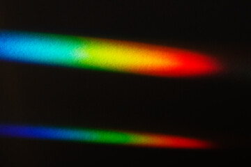 Light leak effect on a black background wallpaper