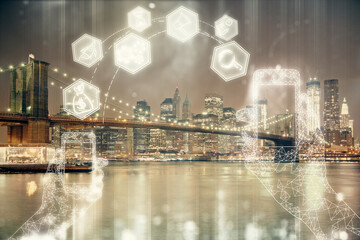 Double exposure of technology theme hologram and cityscape background. Concept of Hightech.