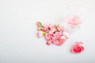 wine in glasses with roses. copy space.place for text