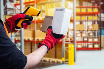 Checking goods using a portable barcode scanner. Scanner for reading barcode in human hands. Warehouse employee holds small boxes. Storage equipment. Concept - sale of barcode scanner. - obrazy, fototapety, plakaty