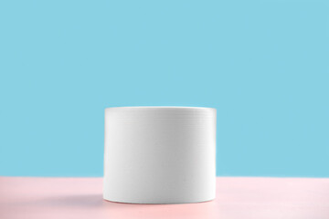 Mock up background with podium for product display. product stand in minimal slyle on blue and pink background.