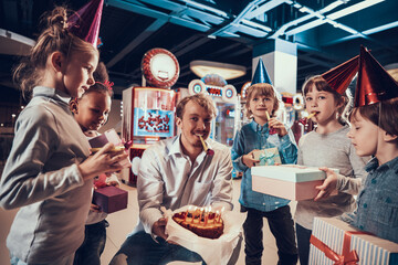 Children gathered in the entertainment center. 