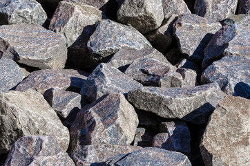 STONES - Piled crushed rocks in the sun