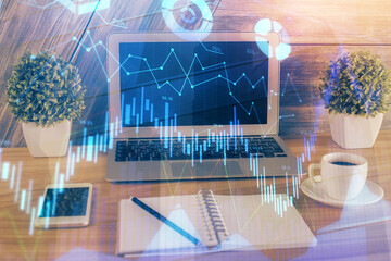 Multi exposure of forex graph and work space with computer. Concept of international online trading.