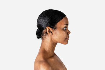 Fototapeta na wymiar Bare chested black woman in a profile shot