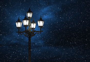 Old street lamp. Night sky. Snowfall. Christmas mood. Old town. Night, street, street lamp...