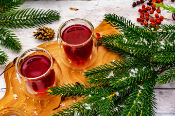 New Year Festive berries liqueur or tincture as ingredient for preparation alcohol cocktail