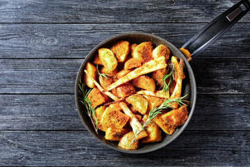 Oven baked root vegetables: parsnip and potato