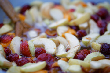 making fruit preserves jam sweet syrup with chopped fruits