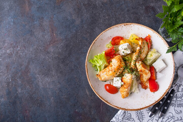 Tasty salad with chicken, pineapple, tomatoes, cheese, lettuce and french mustard. Top view, text space