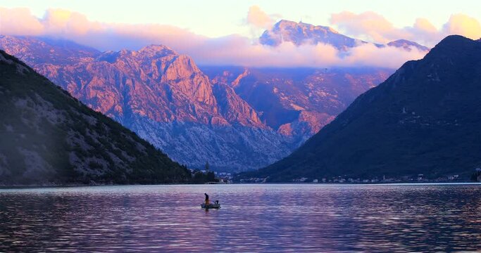 Boat with fisherman in the Kotor Bay, Montenegro 