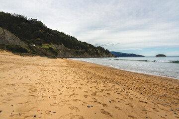 Fototapeta na wymiar Laga's beach in Basque Country during a cloudy day in autumn