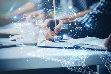 Polygonal hands using tablet with abstract e-mail network. Communication concept. Double exposure.