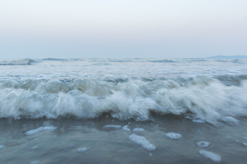 Low angle panoramic view of foamy sea waves at Aksa beach in Mumbai, India
