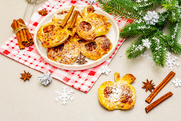 Obraz na płótnie Canvas Christmas or New Year sweet apple puffs, fresh homemade bakery