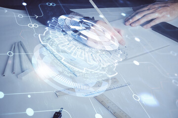 Human hands with tech theme multi exposure drawings.