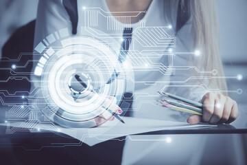Multi exposure of woman's writing hand on background with data technology hud. Big data concept.