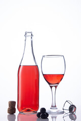 Bottle and glass of Lambrusco wine  on white background..