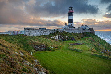 Fototapeta na wymiar The 18th Tee Box At The Old Head Of Kinsale With The Lighthouse Looking On