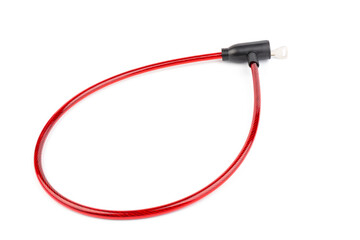 Fototapeta premium Flexible red bicycle cable with key on white background. Security and safety concept.